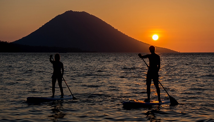 Ride the Waves: Stand Up Paddle Boarding at Siladen Resort & Spa